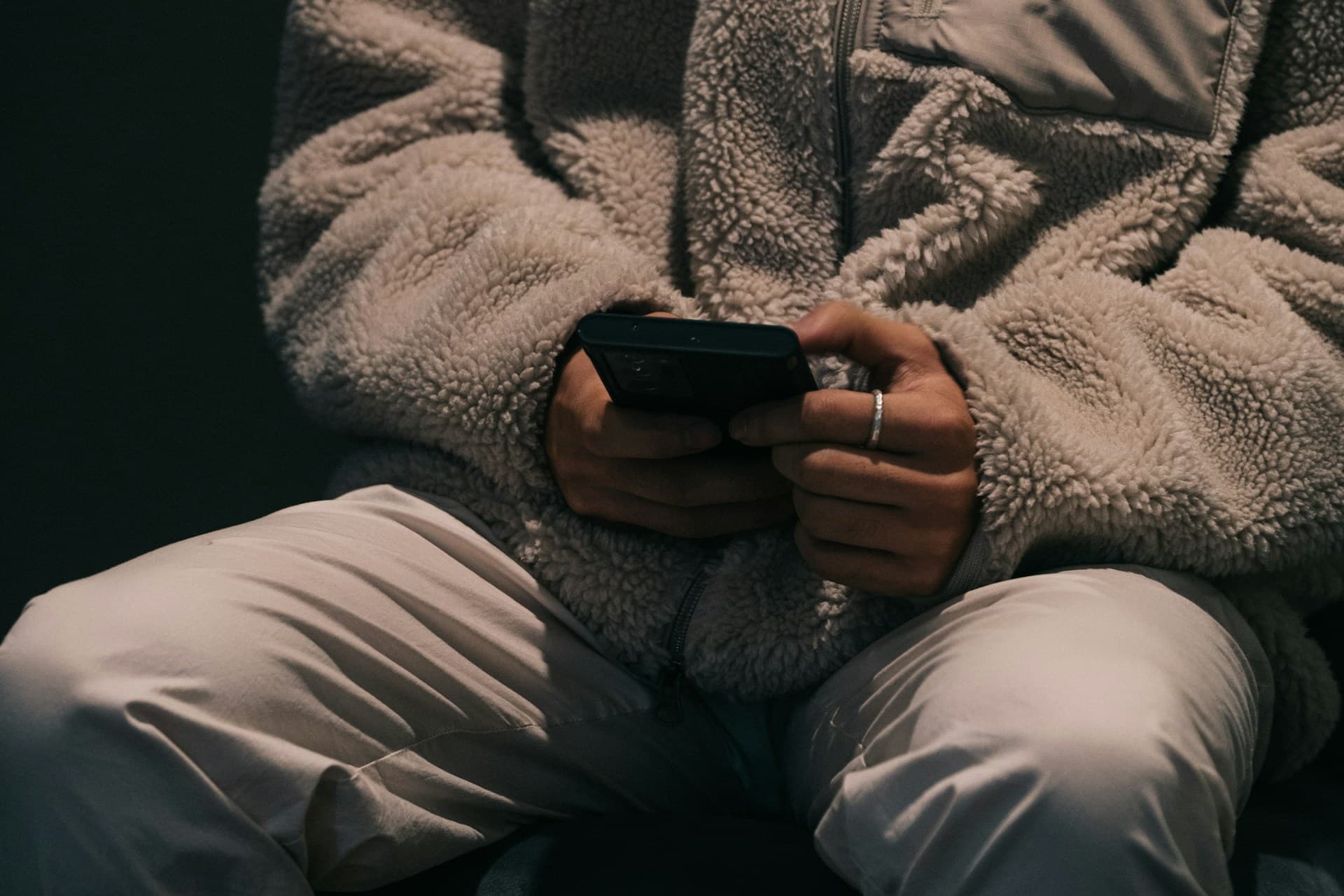 A person is playing a game on their phone